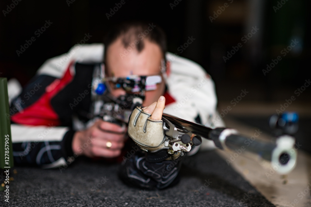 Sport shooting. Man on sport shooting training practicing for competition Sport shooting. Man on sport shooting training practicing for competition