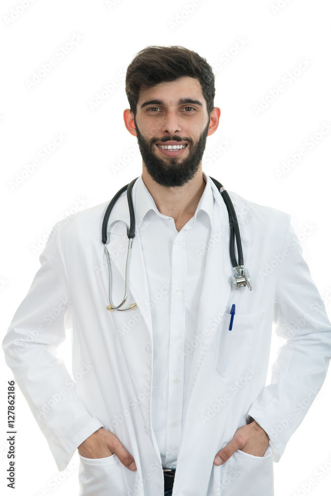 Young serious handsome bearded doctor with white coat and stethoscope. Young serious handsome bearded doctor with white coat and stethoscope.