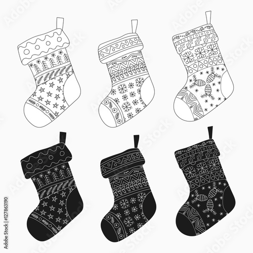 Vector collection of Christmas stockings. Stylized winter black and white socks. Set of decorative Christmas stockings with ornaments. Merry Christmas.