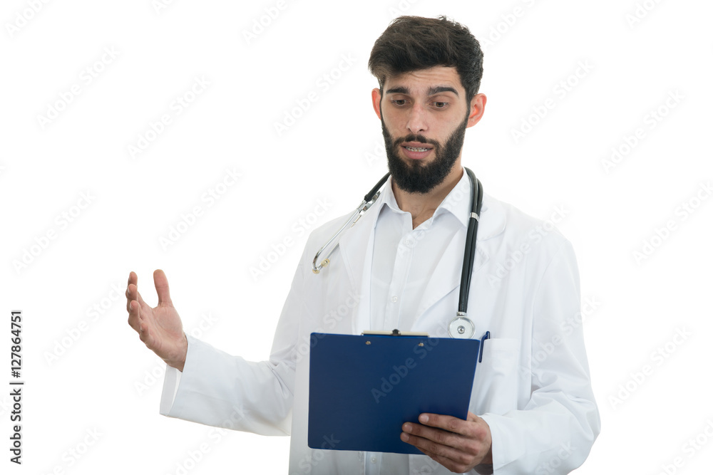 Male Doctor standing with folder, isolated on white background Male Doctor standing with folder, isolated on white background