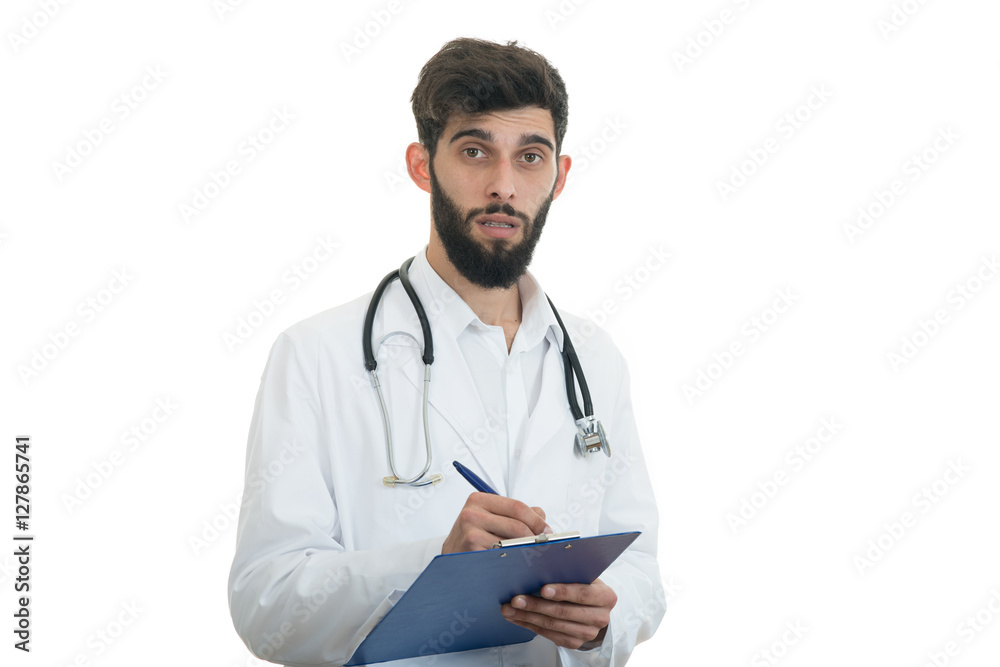 Fototapeta premium Worried young doctor with head in hand on white background