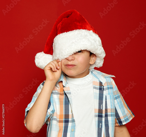 boy child portrait on red  winter holiday concept