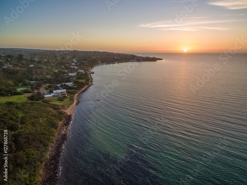 Aerial panorama of Mornington Peninsula coastline near Olivers Hill at beautiful sunset. Melbourne, Victoria, Australia