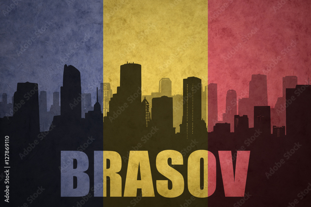 abstract silhouette of the city with text Brasov at the vintage romanian flag