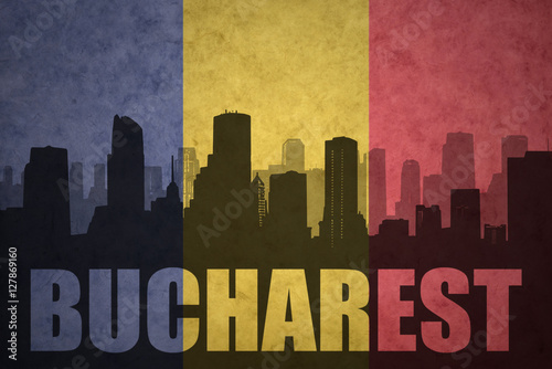 abstract silhouette of the city with text Bucharest at the vintage romanian flag