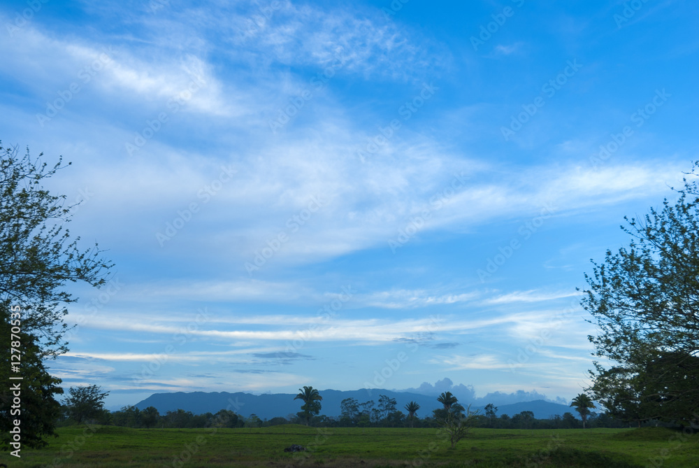 Blue sky with clouds and trees in Guatemala