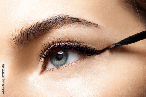 Make-up with black eyeliner close-up photo