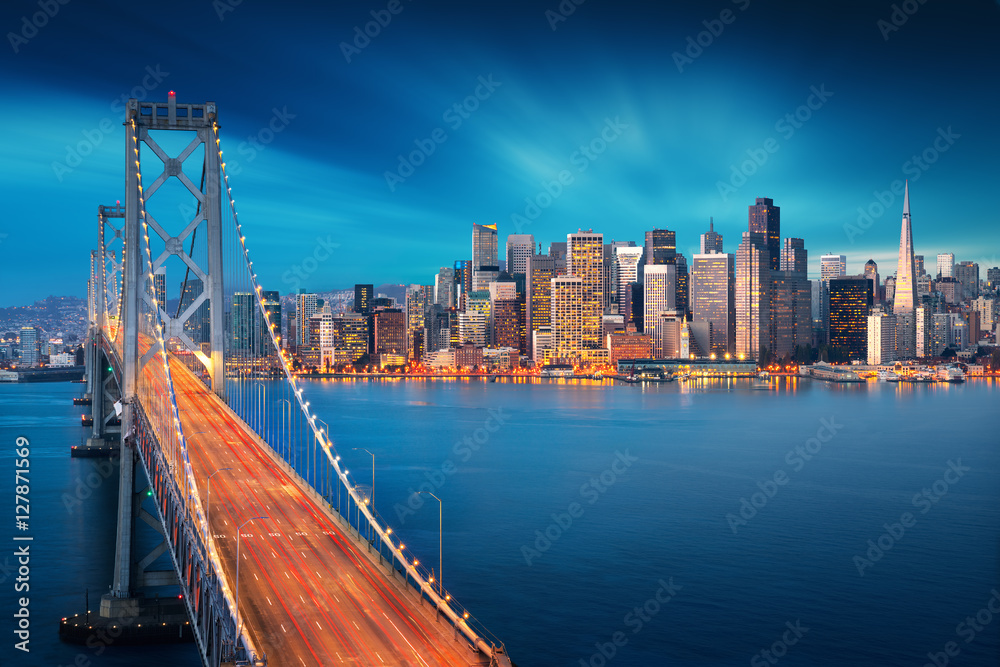 San Francisco at sunrise with Bay Bridge in foreground. Amazing view to famous America city. California theme. Art Photography.