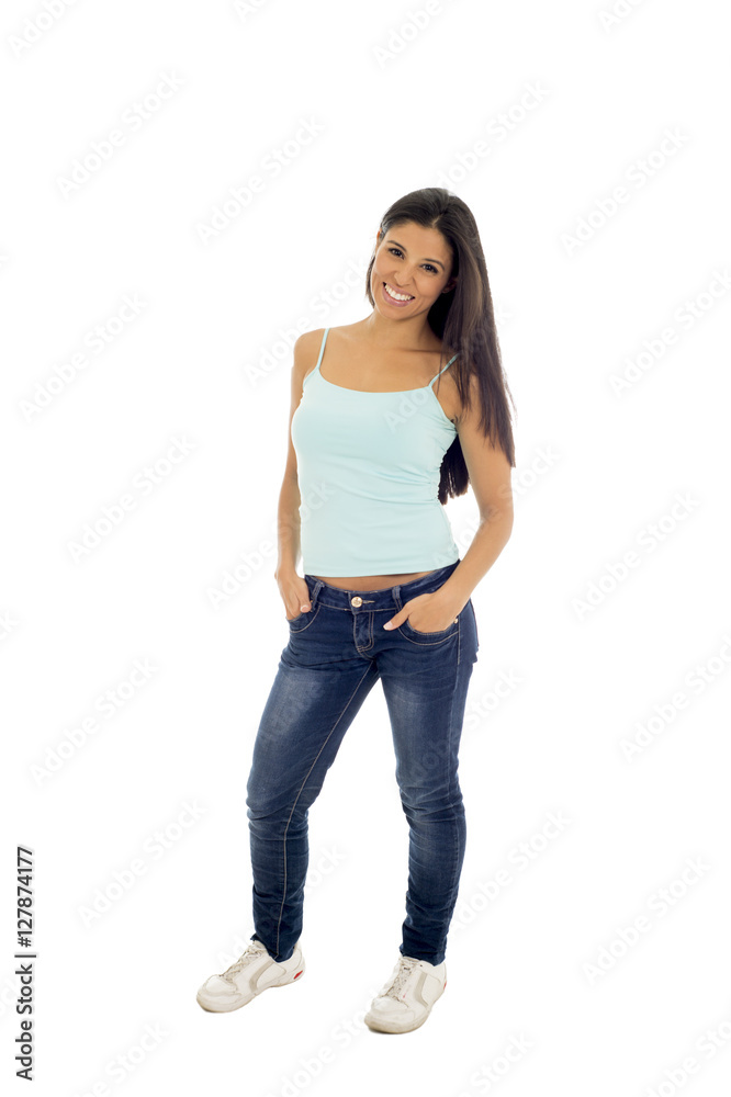 young attractive hispanic woman in casual top and jeans smiling happy and cheerful isolated young attractive hispanic woman in casual top and jeans smiling happy and cheerful isolated