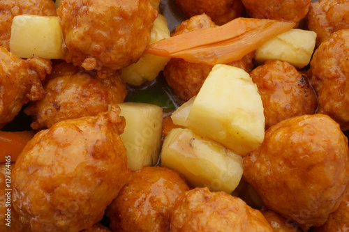 Chinese food. Sweet and sour meatballs with pineapple
