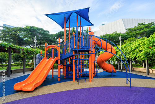 Colorful playground on yard at HDB apartment in Singapore photo
