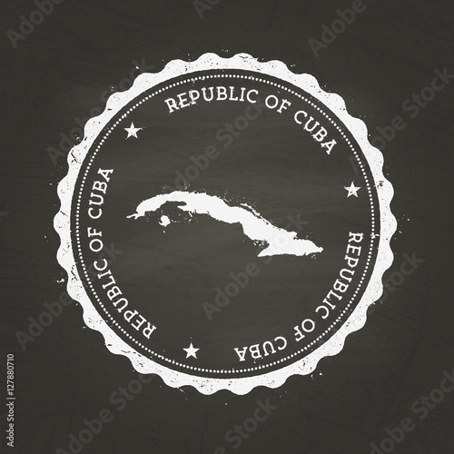 White chalk texture rubber stamp featuring the map of the Republic of Cuba on a black schoolboard background. Grunge seal illustration.