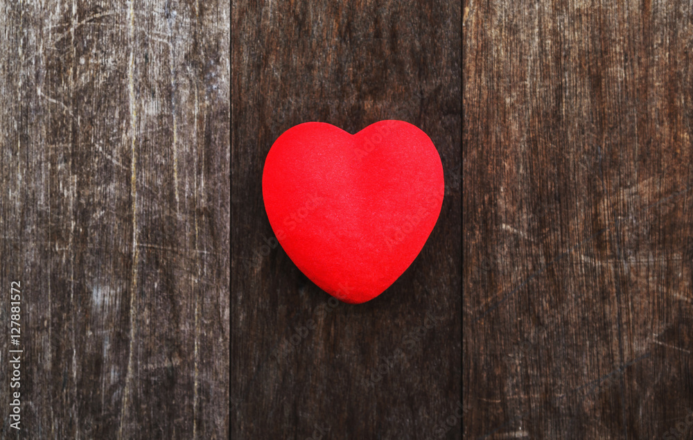 red heart on old wood background texture red heart on old wood background texture