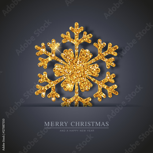 minimalistic elegant christmas card with glittering snowflake on a dark blue background