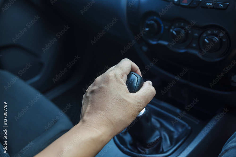 Man hand on manual gear. Man hand on manual gear.