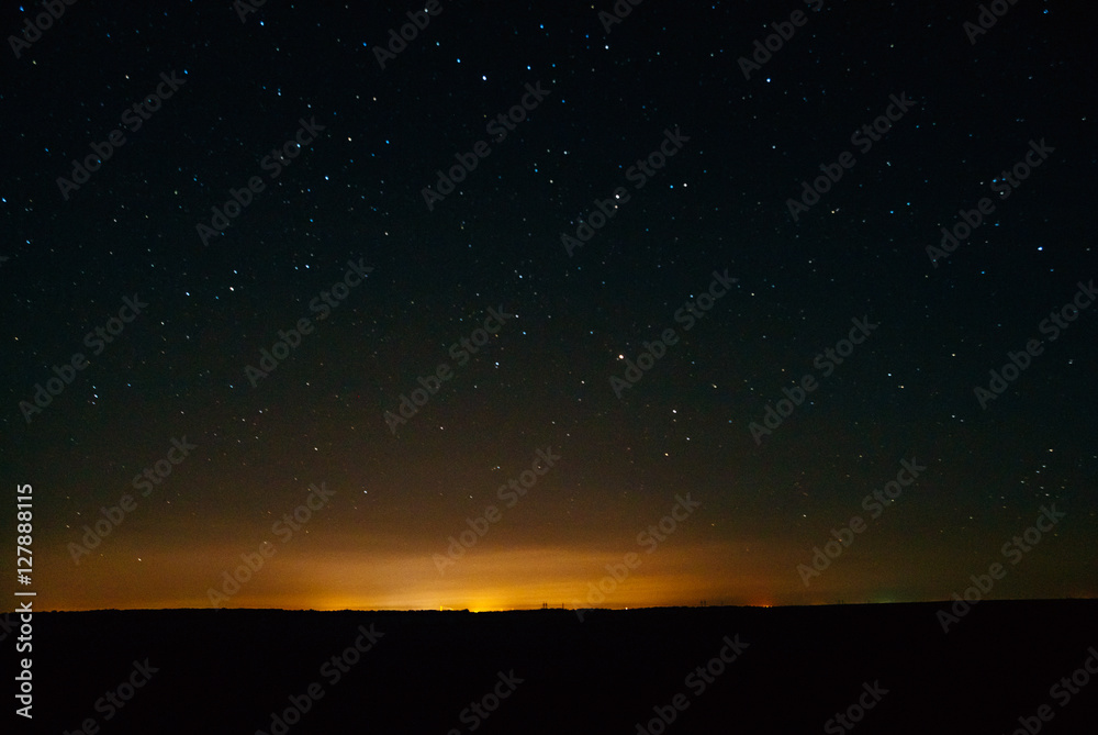 Night glow and a starry sky