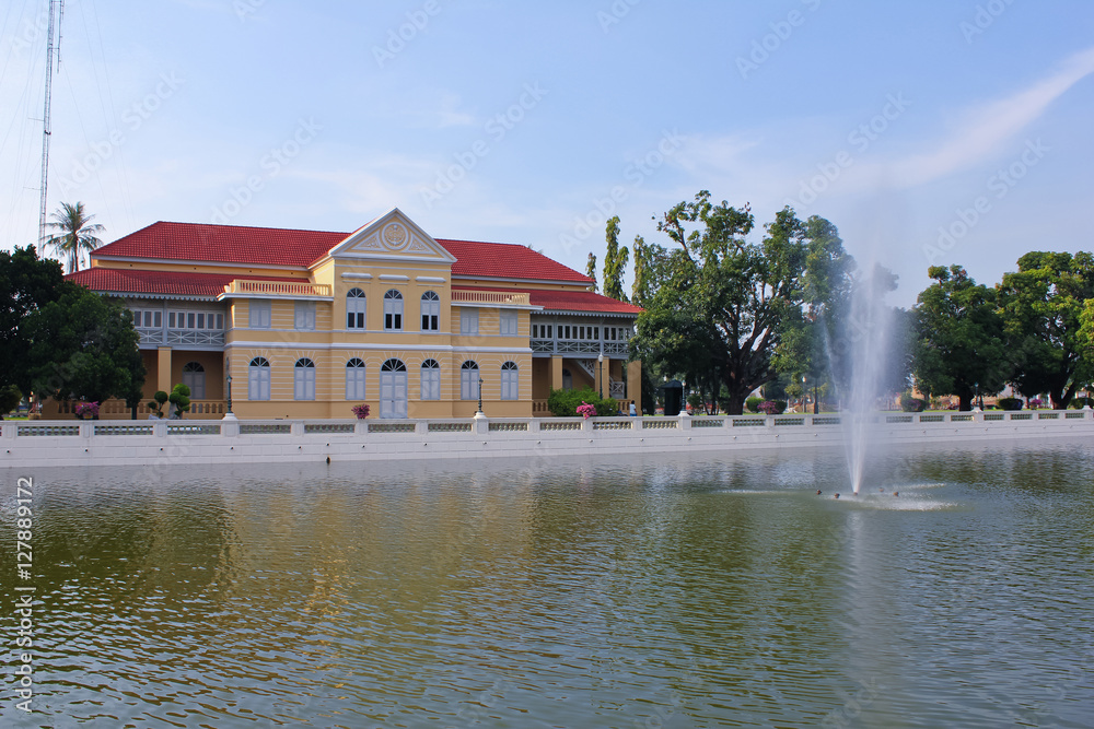 Obraz premium European villa and pond / A landscape view of European villa and a pond in Thailand park, Ayutthaya 