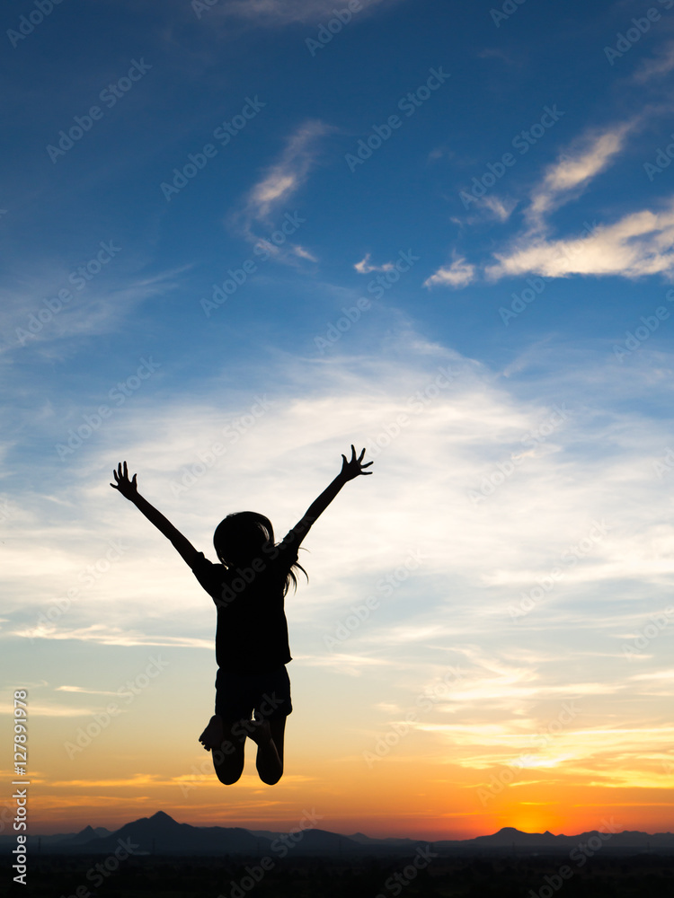 Young woman enjoying outdoors, sky background,sunset