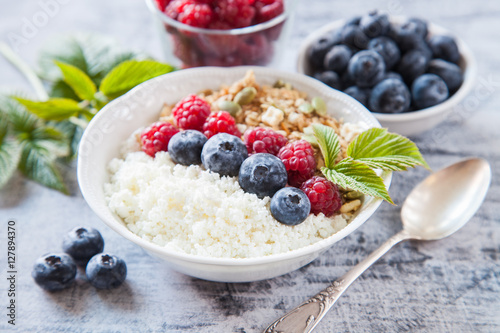 cottage cheese, muesli and fresh fruit for breakfast, selective focus