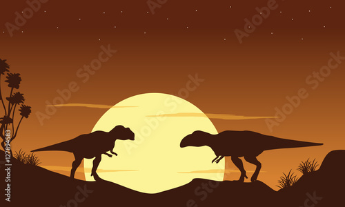 Silhouette of two mapusaurus landscape