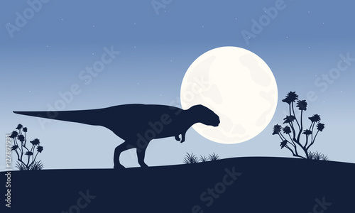 Silhouette of Mapusaurus with big moon scenery