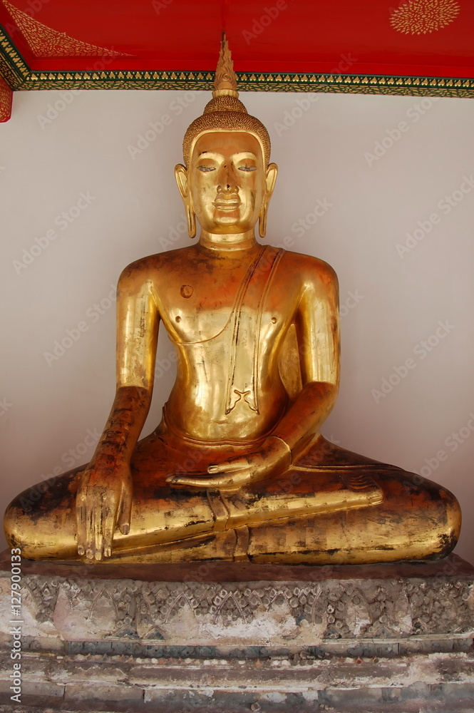 Ancient statue of golden Buddha in Bangkok, the capital of Thailand Ancient statue of golden Buddha in Bangkok, the capital of Thailand