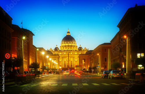 road to St. Peter's cathedral in Rome at night with lights, Italy, toned © neirfy