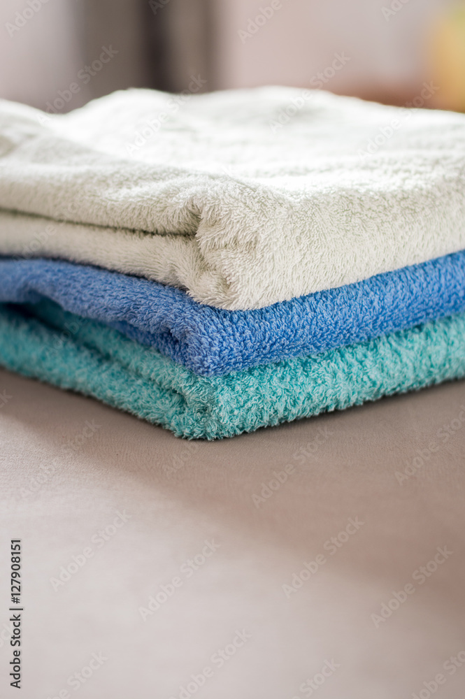 a stack of towels
a stack of towels