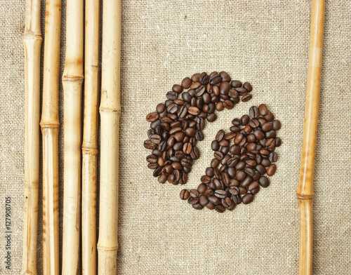 coffee beans on a sack background photo