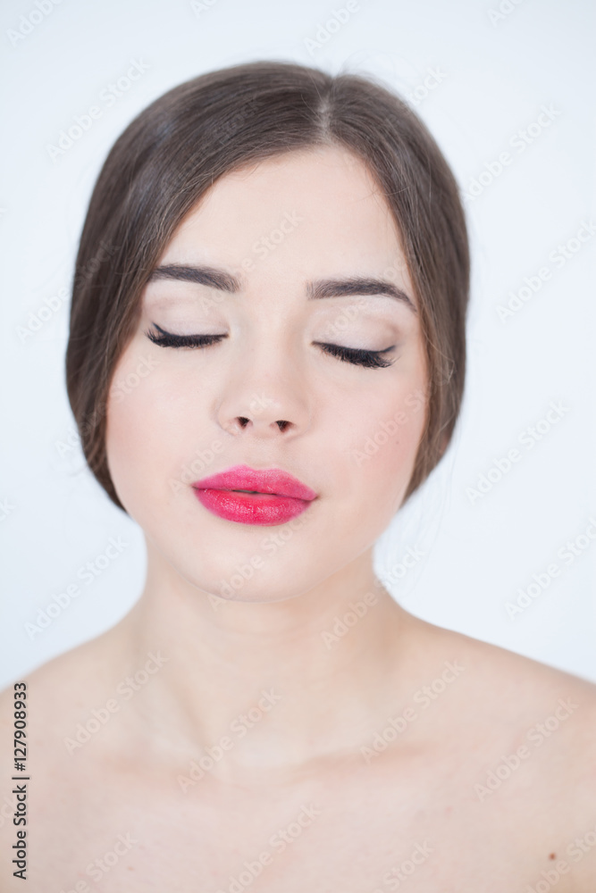 Beautiful Young Woman with Fresh Clean Skin touch own face. Red lips, red lipstick. Cosmetology, beauty and spa. Beautiful Young Woman with Fresh Clean Skin touch own face. Red lips, red lipstick. Cosmetology, beauty and spa.