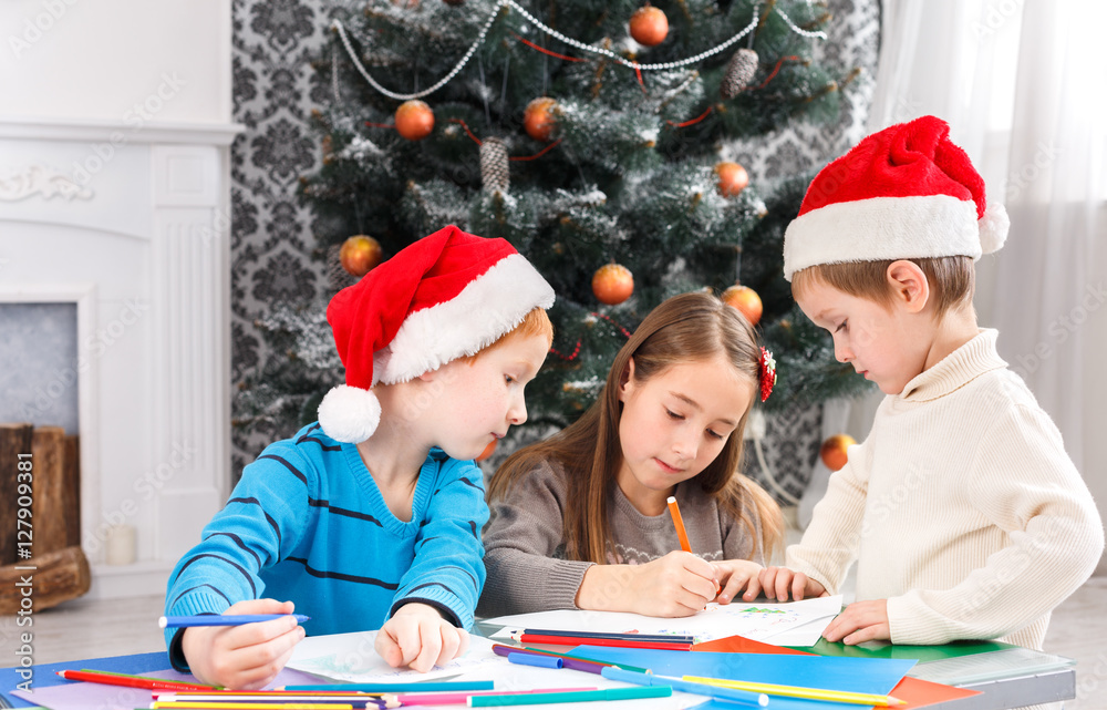 Children writing letter to santa, wait for christmas