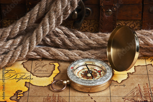 compass and rope on map