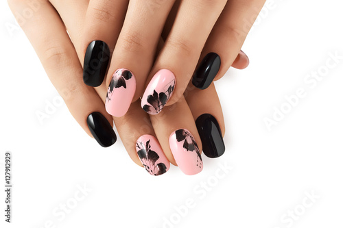 Abstract floral pattern on nails.