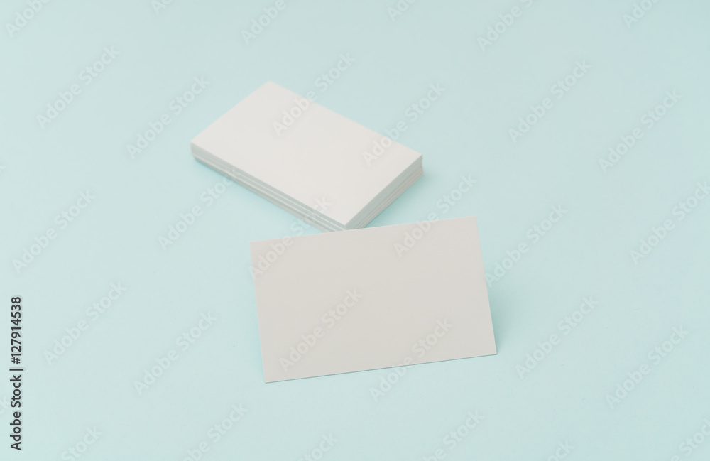 Fototapeta premium Blank business card on blue background .