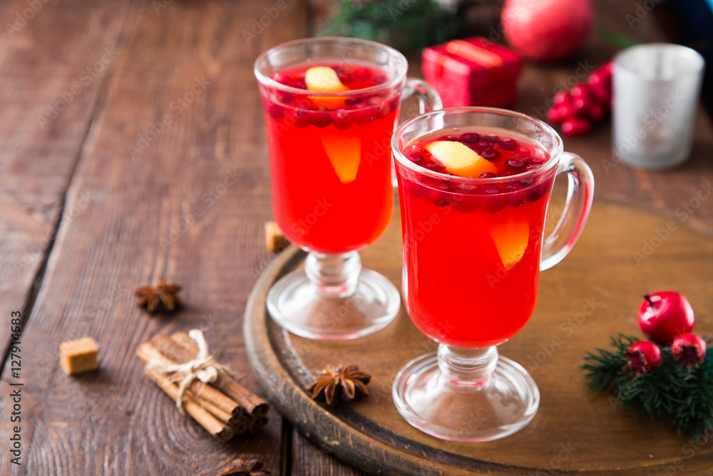 Christmas card. hot spicy Christmas drink of cranberry and spice