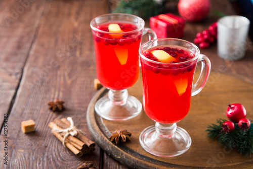 Christmas card. hot spicy Christmas drink of cranberry and spice