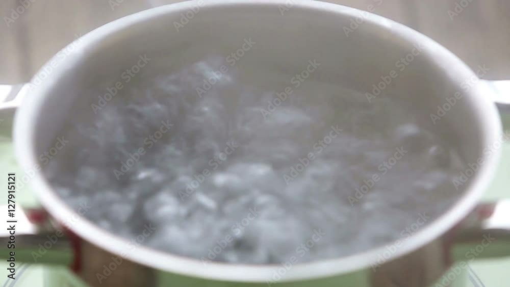 closeup of boiling water in silver pot
closeup of boiling water in silver pot