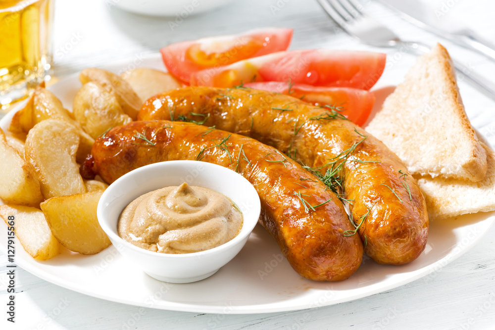 fried sausages with potatoes, mustard and beer fried sausages with potatoes, mustard and beer