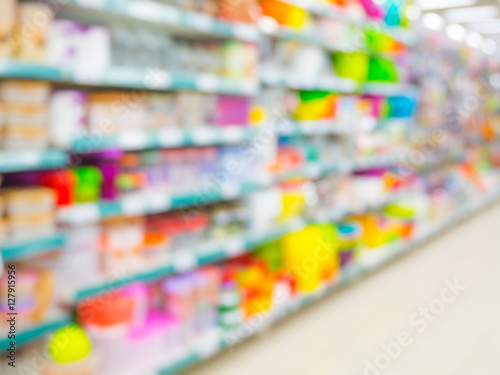 Wallpaper Mural Blurred colorful supermarket products on shelves Torontodigital.ca