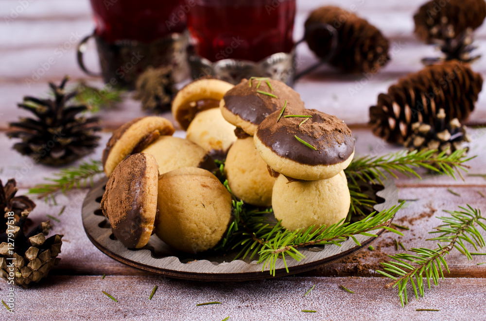 Cookies mushrooms with chocolate icing