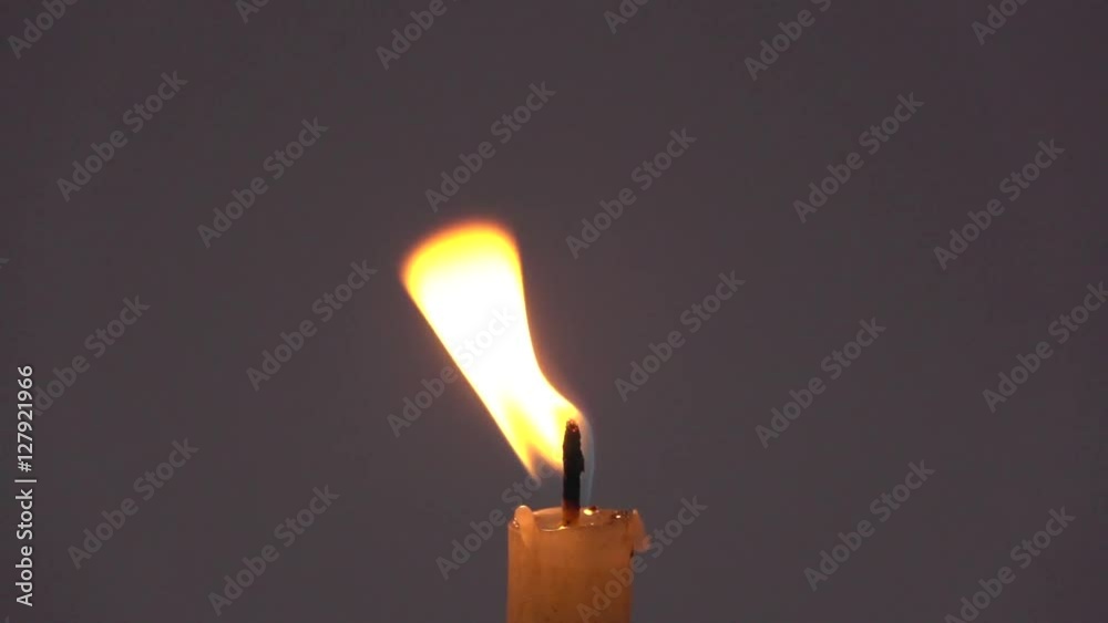 closeup of candle on black closeup of candle on black