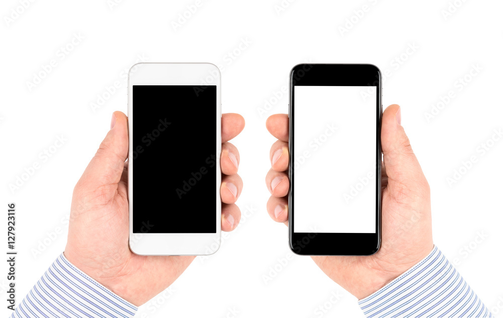 Isolated on white hands holding smartphones with blank screen.