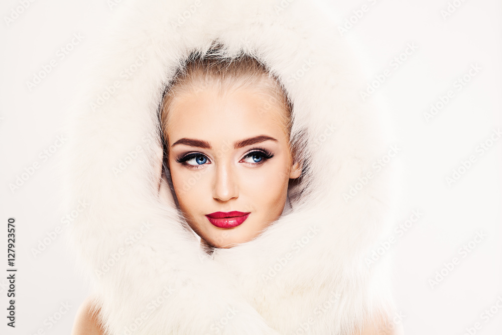 Beautiful Winter Woman Fashion Model in White Fur