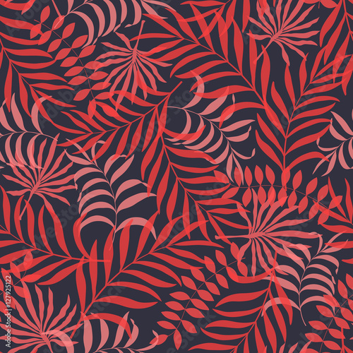 Tropical background with palm leaves. Seamless floral pattern