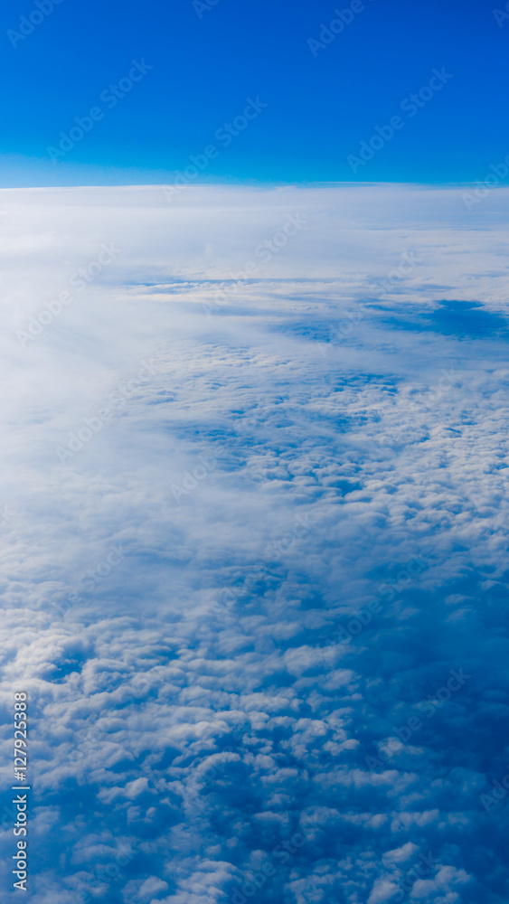  clouds from airplane window. height of 10 000 km.  Clouds