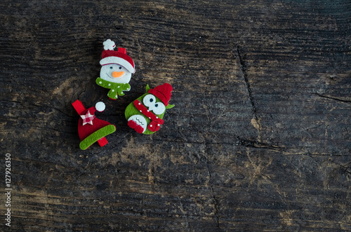 Christmas symbols on wooden background