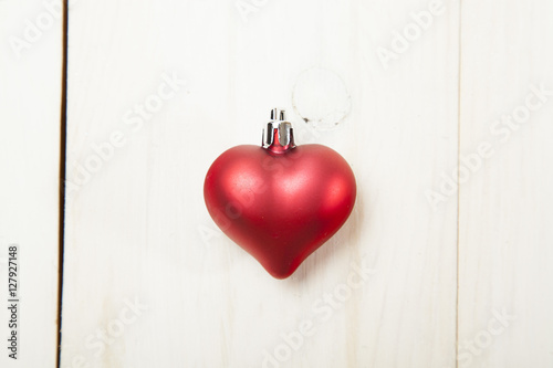 Heart on a white wooden table