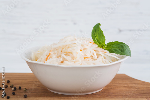 The sauerkraut in ceramic bowl