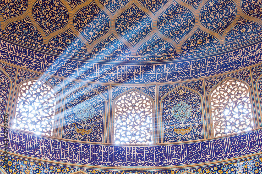 Isfahan, Iran - December 13, 2015: Sheikh Lotfollah Mosque at Naqhsh-e Jahan Square in Isfahan, Iran. Ceiling view