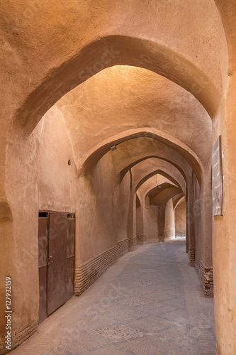Old passage with traditional clay arches in the city of Yazd  Ir
